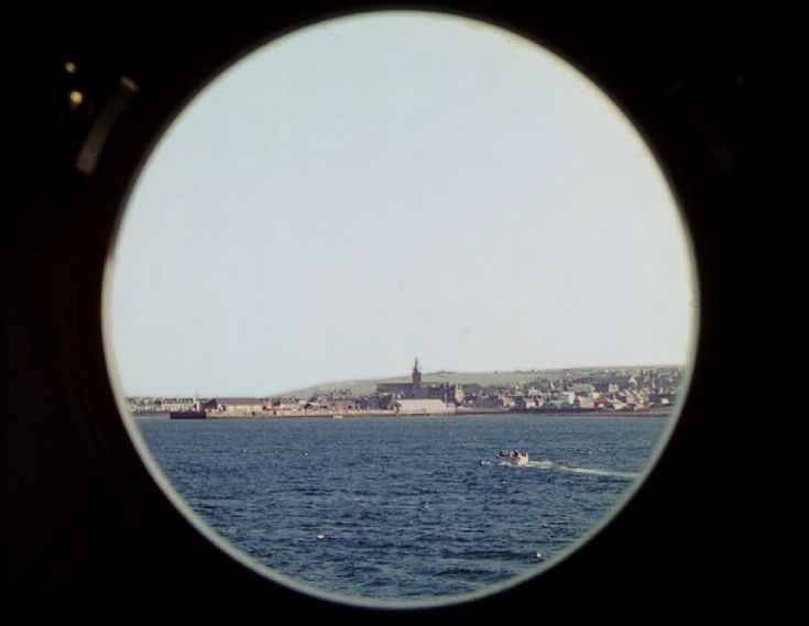 Kirkwall through a porthole of Devonia, June 1966.