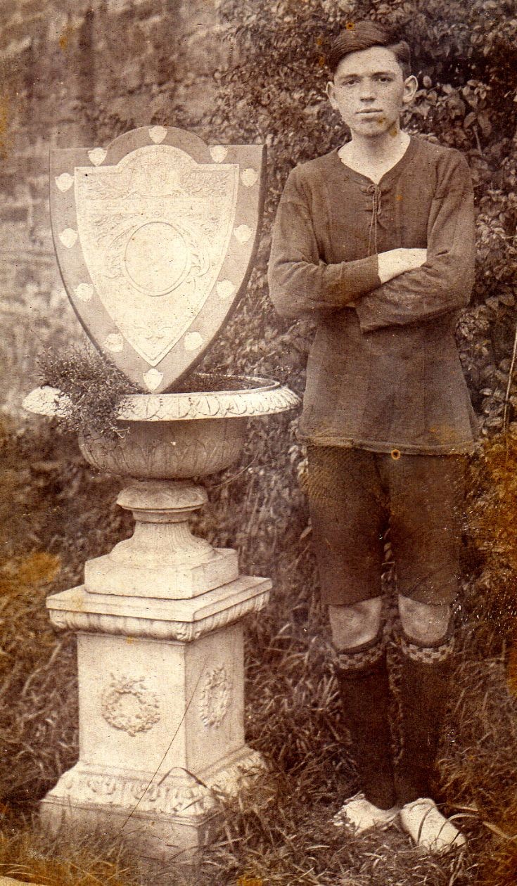 William Isbister, KGS captain, with soccer shield