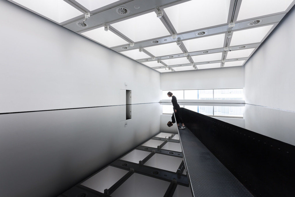 02 installation view of richard wilson  20 50  %281987%29 at space shifters   %c2%a9 copyright the artist  courtesy hayward gallery 2018. photo  mark blower