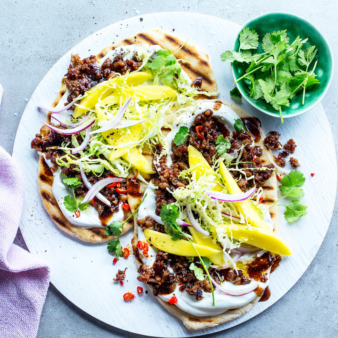Asian mince flatbreads with mango slaw