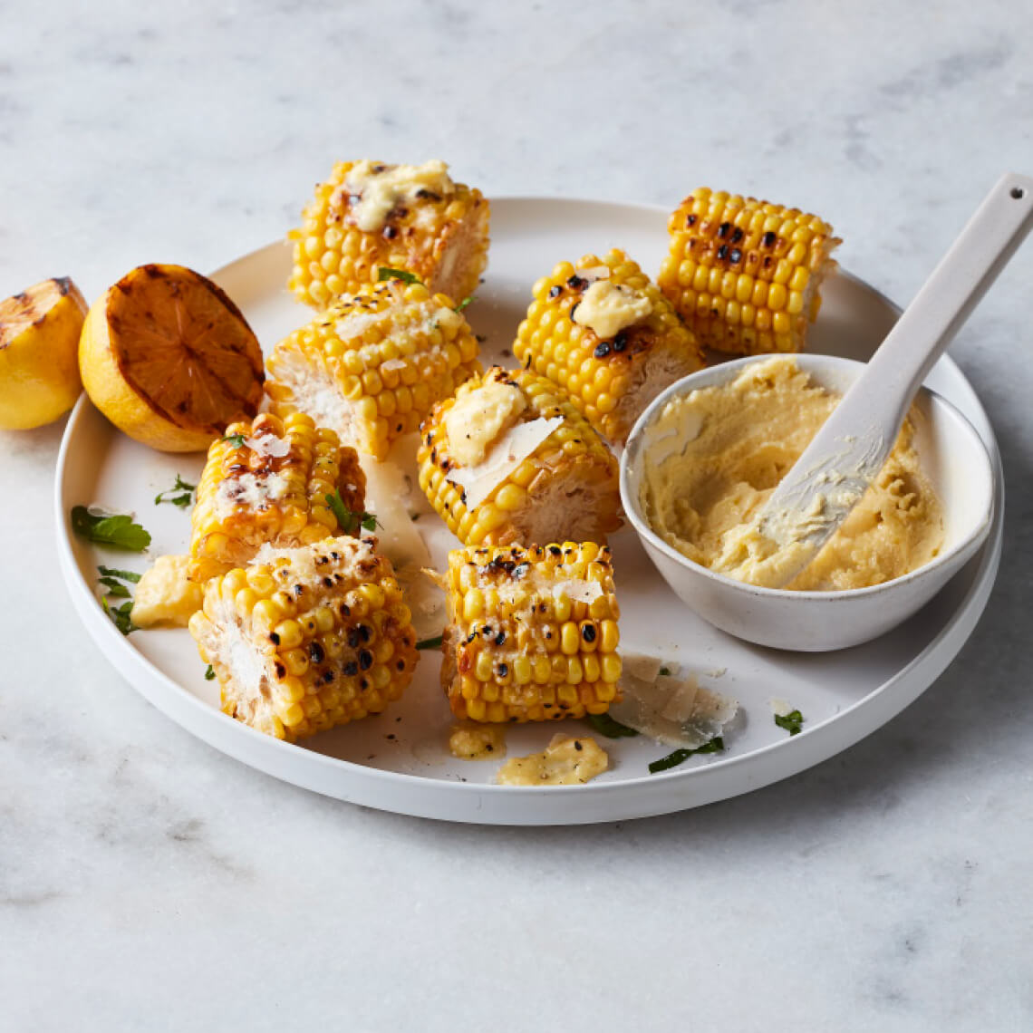 Corn cobettes with lemon and parmesan butter