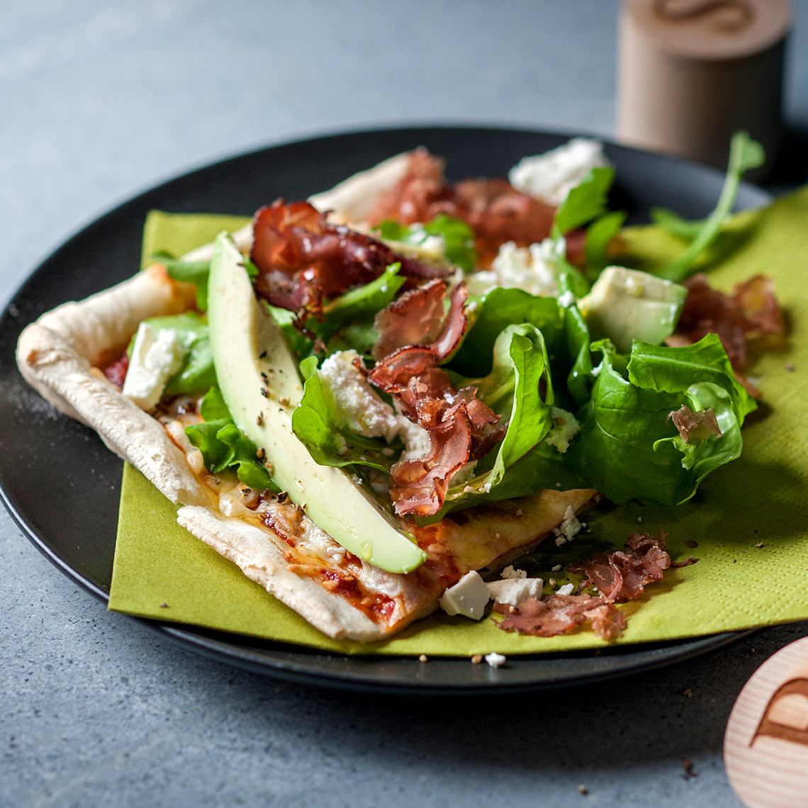 Party pizza with biltong, avocado and feta