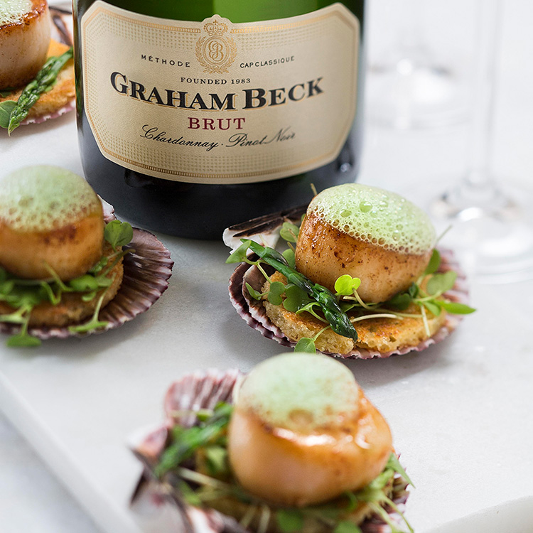 Pan-seared scallops with brown butter on buttery brioche