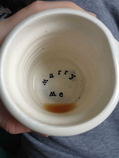 marriage proposal with a cup engraving