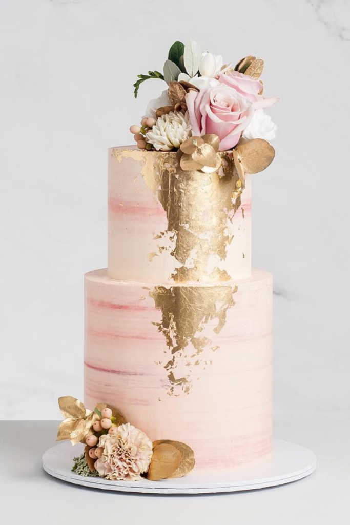 Pink Wedding Cake With Gold Details and flowers