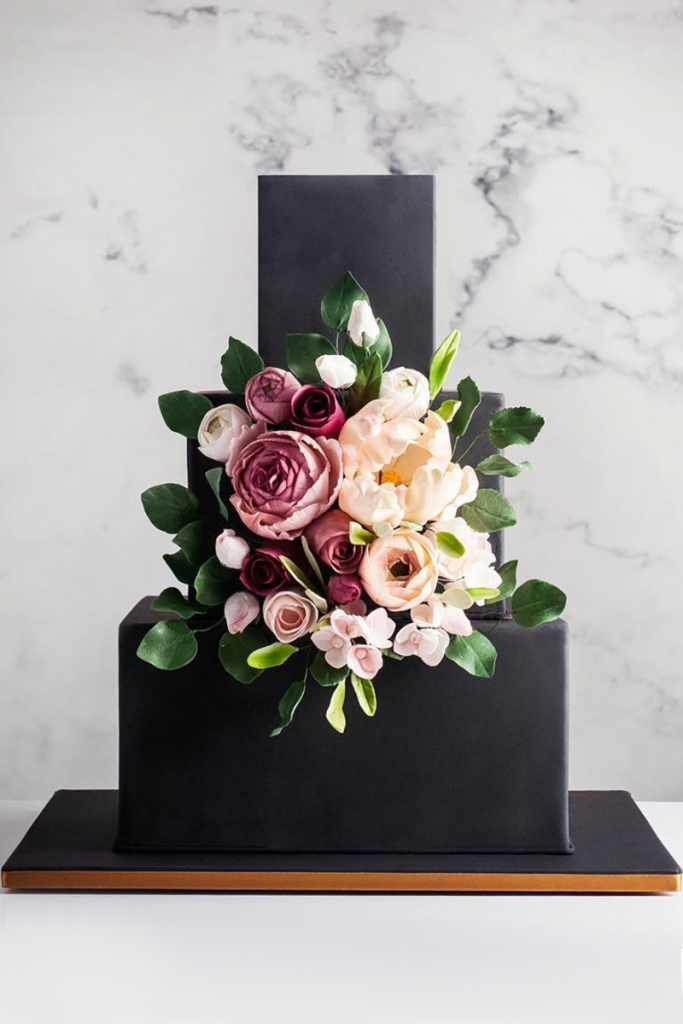 Black Geometric Wedding Cake with Flowers