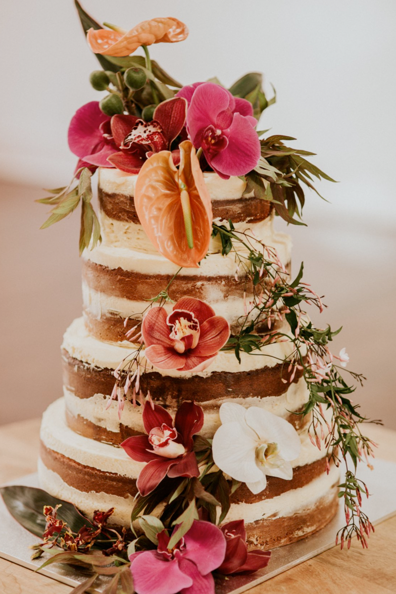 Naked Wedding Cake with Floral Arrangements
