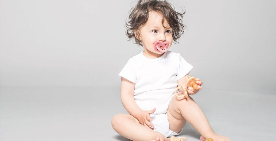 HEVEA just added colour to their plastic-free pacifiers