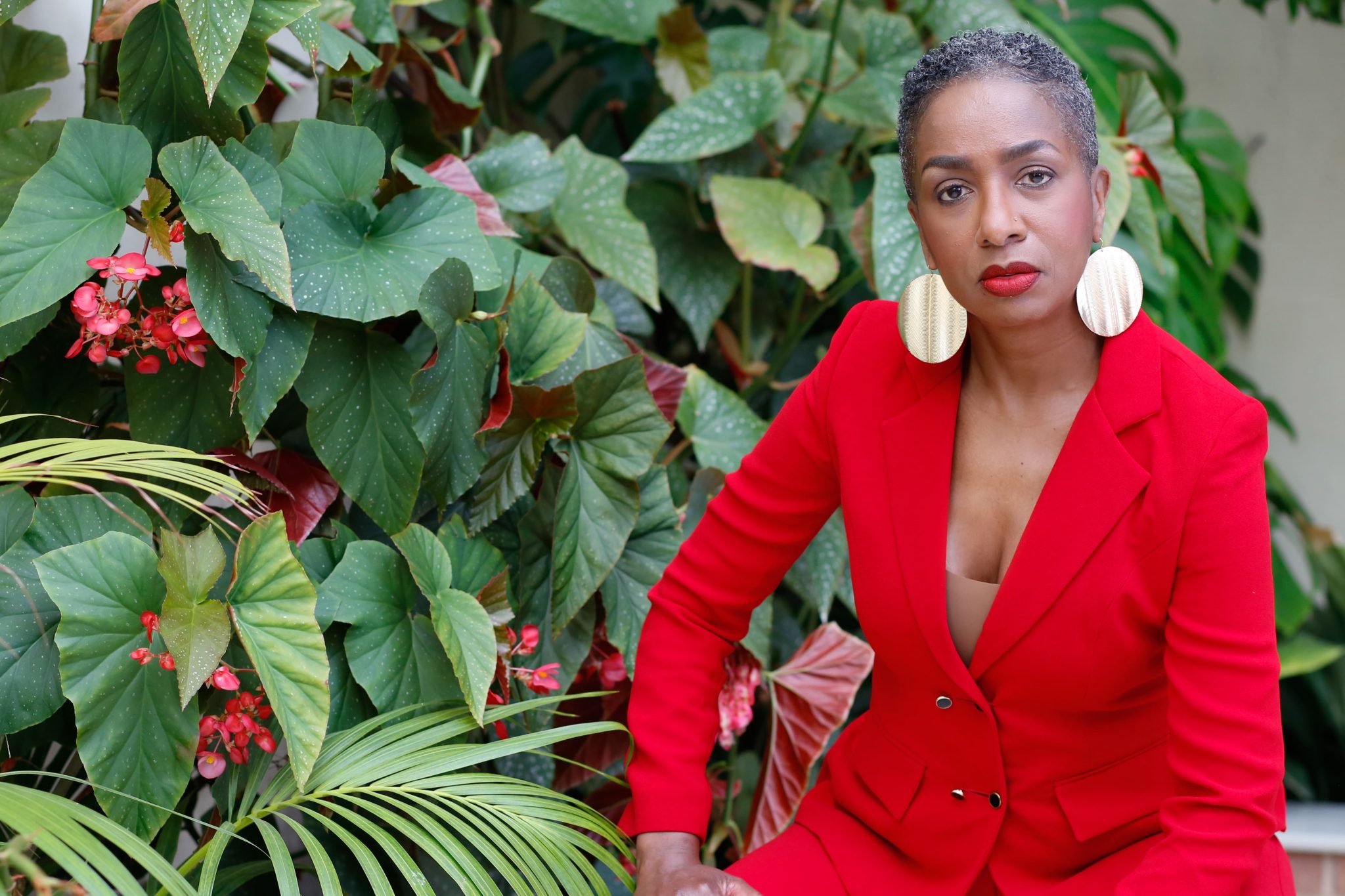 Sinclair red jacket on location 2-min