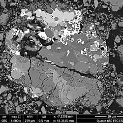 Back-scatter electron images of phases and clasts in sample 73002,6013