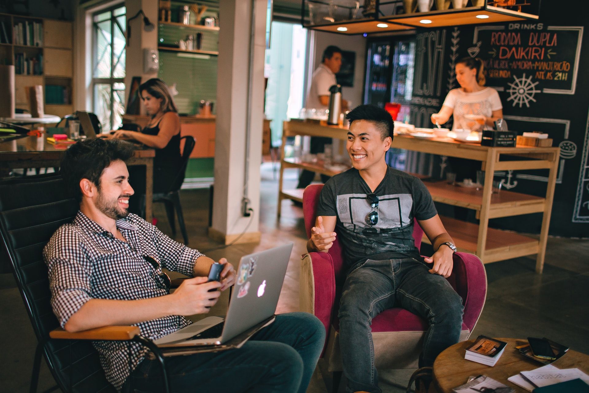 People working at a shared workspace.