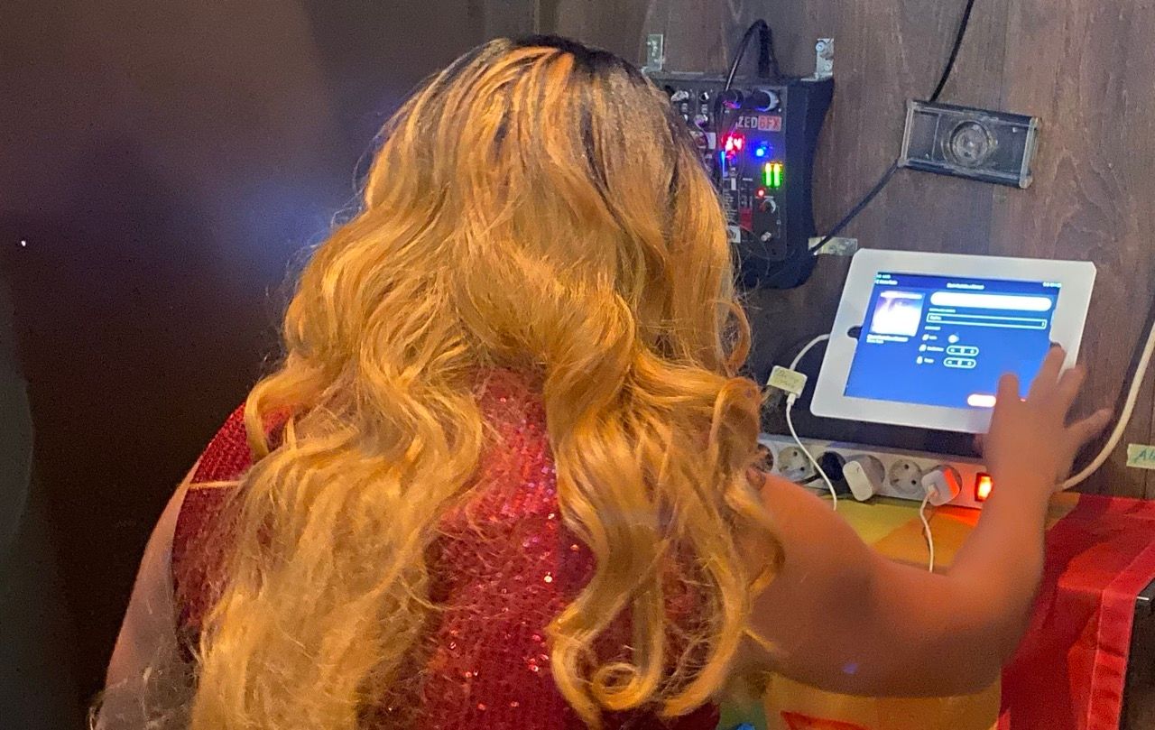 Singer selecting their own song at Street Pride