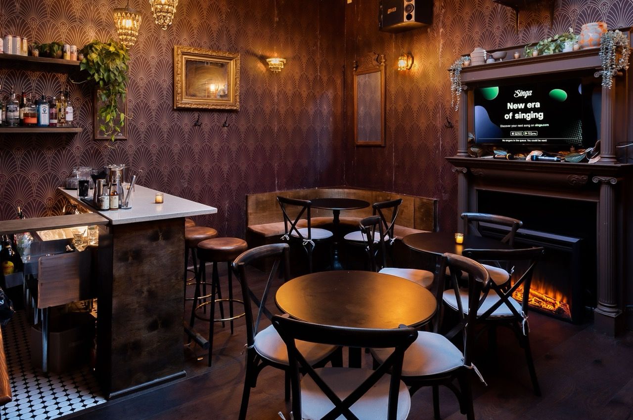 The karaoke room at AUX Karaoke Box.