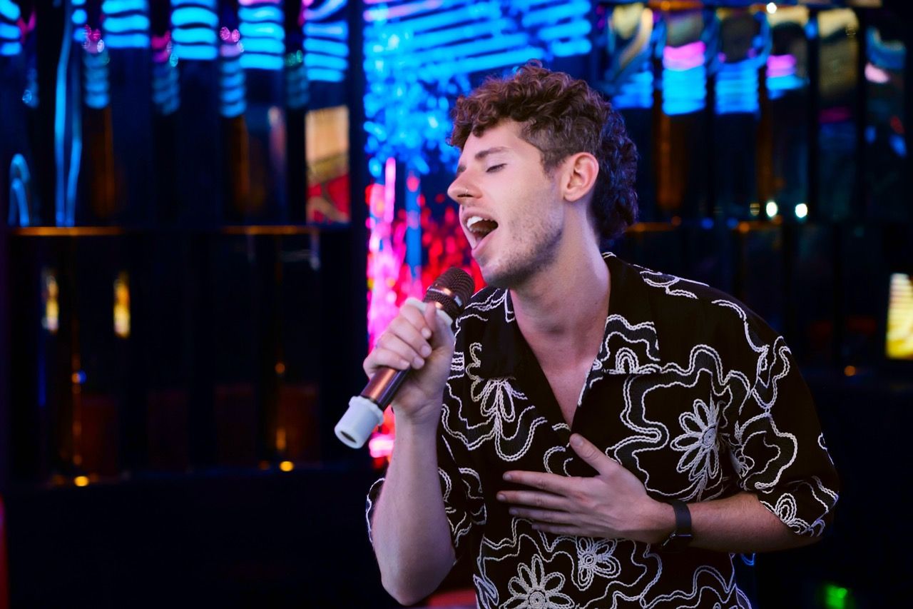 Man singing karaoke at VIVA karaoke