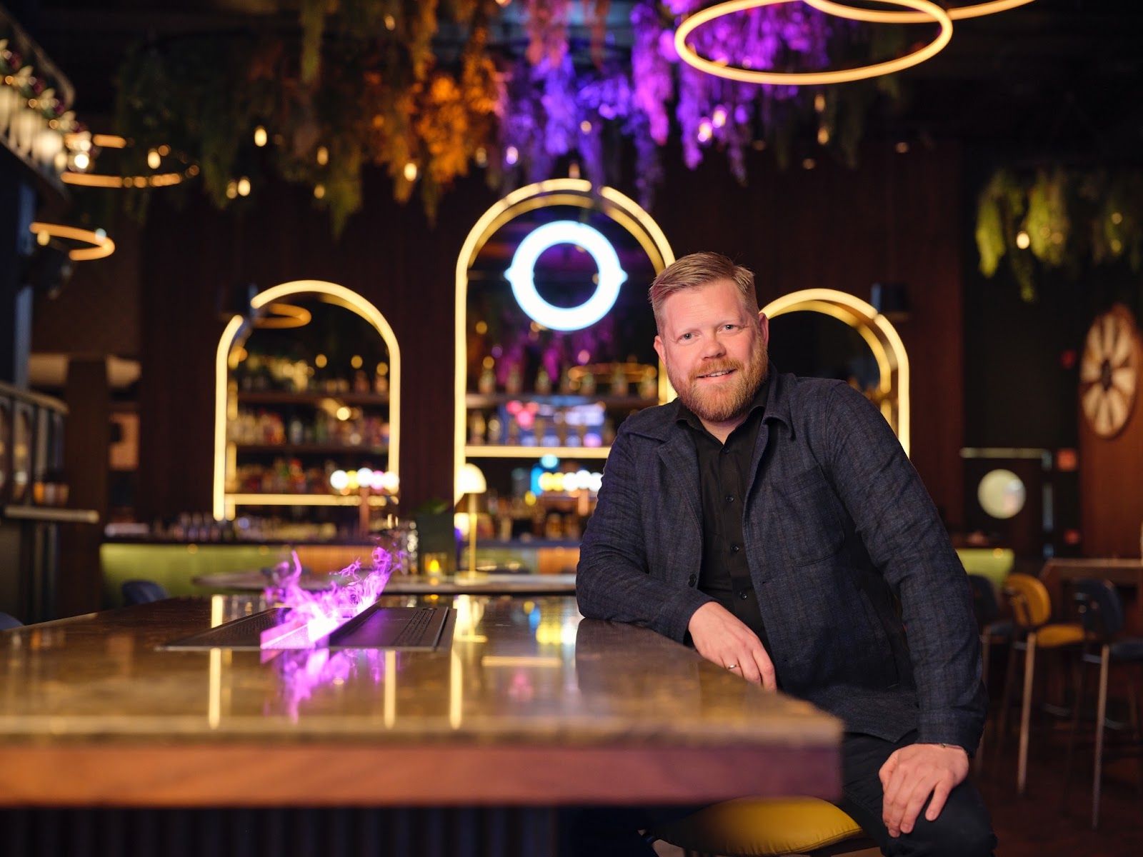 Inside Oche Reykjavik, a darts-led competitive socialising venue with private karaoke rooms