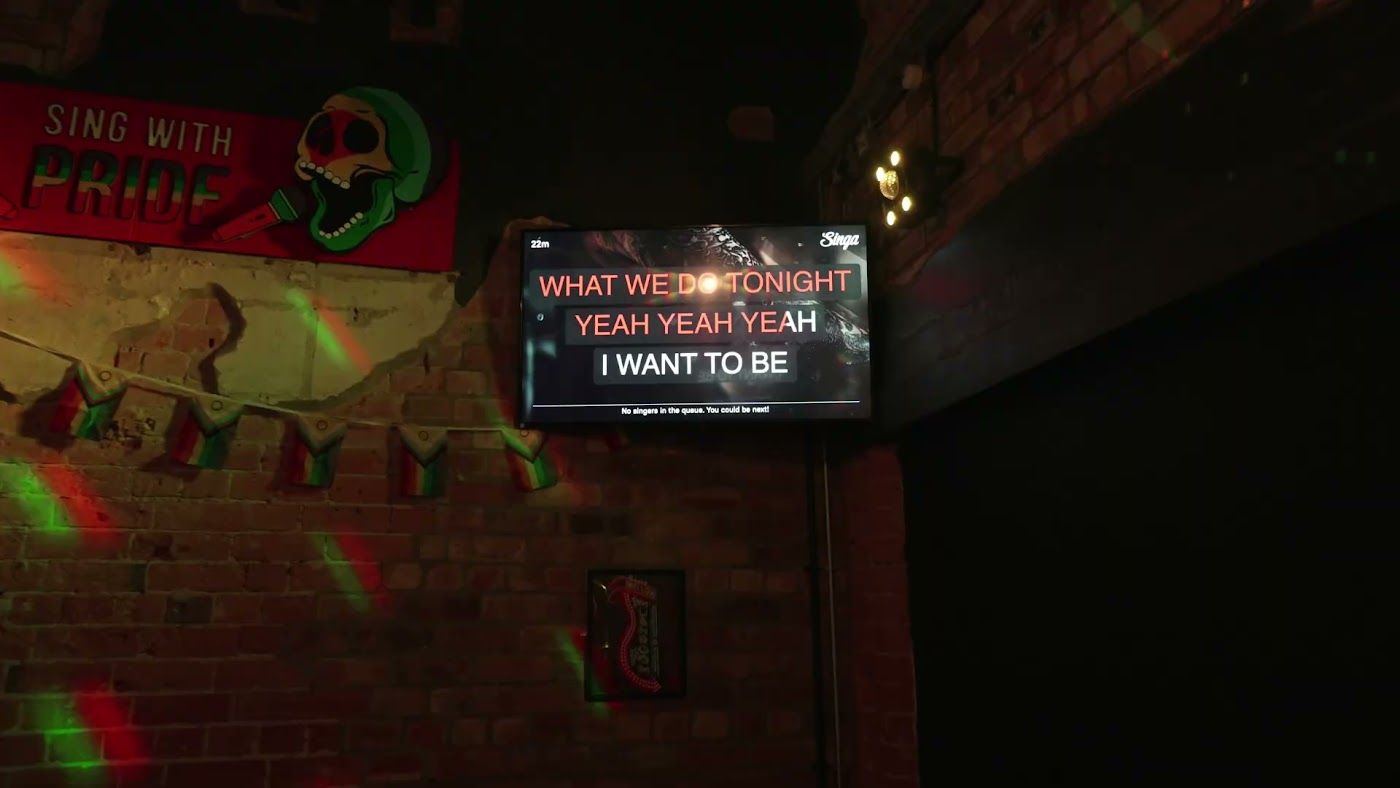 One of MOJO's themed private karaoke rooms, powered by Singa