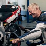 David in the garage with his motorbike