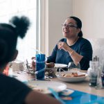 Teusday eating dinner with her children