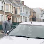 Ben getting into the car