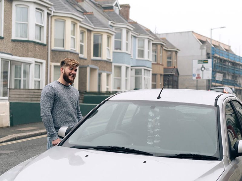 Ben getting into the car