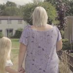 Suzie walking away with daughter