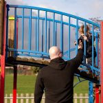 Martin at a play area with daughter