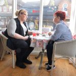 Sue and her daughter Sam in a cafe