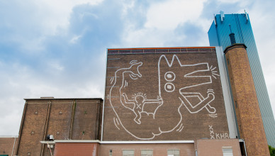 Keith Haring muurschildering, 1986. Foto Hanna Hachula. Artwork © Keith Haring Foundation