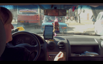 Polina Medvedeva, "The Champagne Drinkers: Russia's Informal Economy from the Back Seat of a Taxi", 2015-2018, video projection, 2-channel video installation on 4 smartphones, 5 car seats, courtesy the artist.