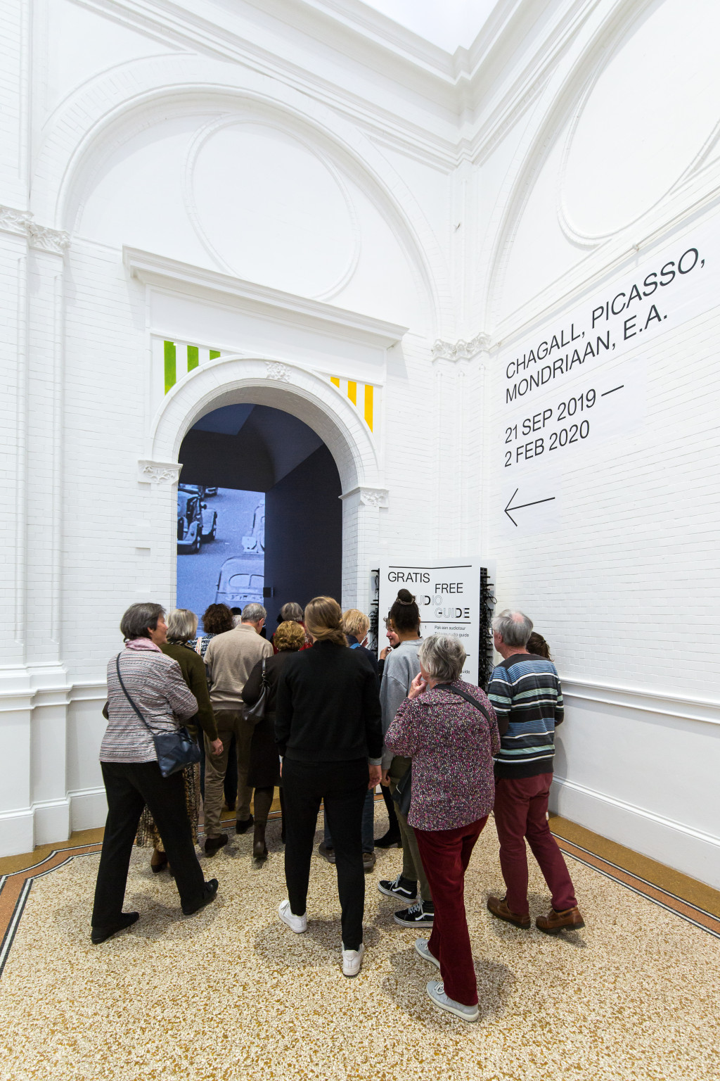 Visitors at the entrance to the exhibition. Photo: Maarten Nauw.
