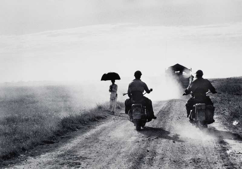 Robert Capa, On the Road from Namdinh to Thaibinh, Indochina (Vietnam), May 25, 1954.