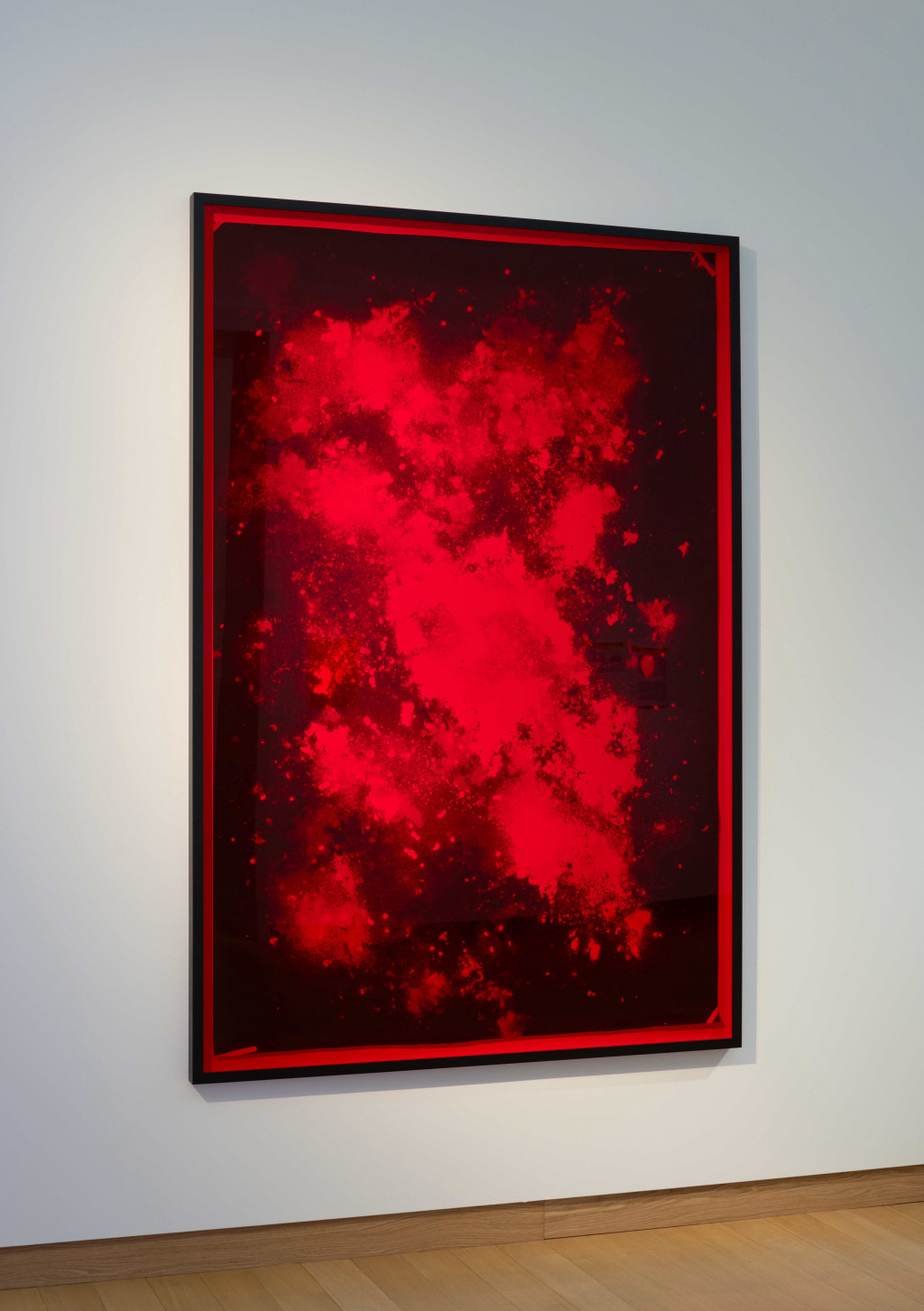 Fotografische print op lichtgevoelig papier met rode perspex plaat