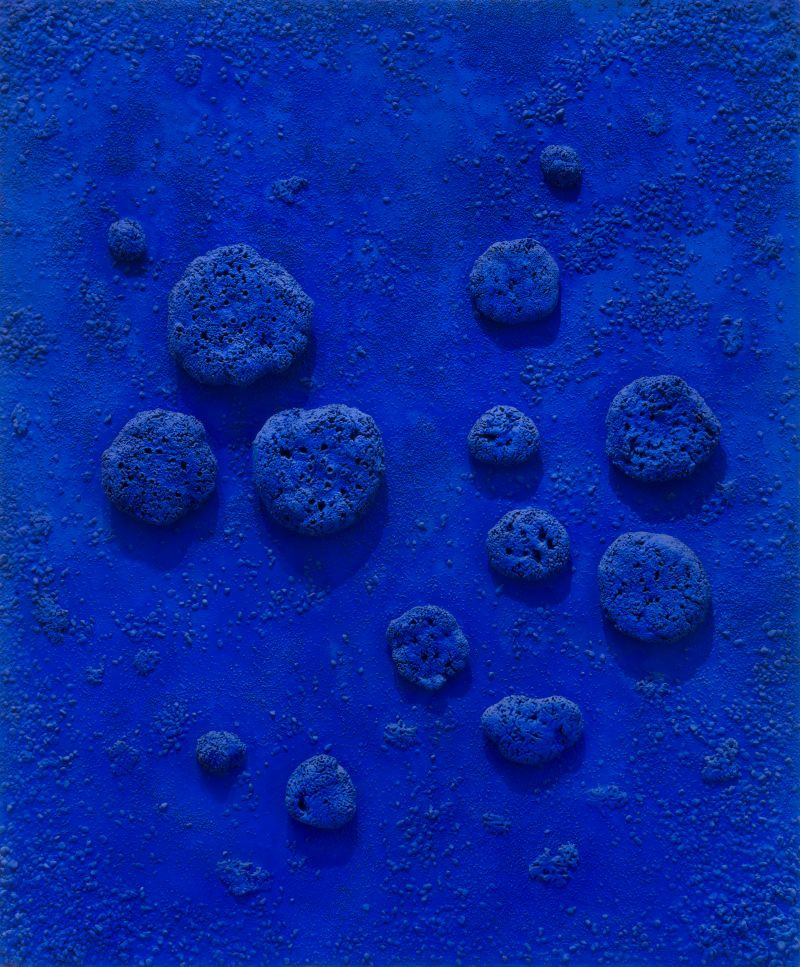 Blue painting with bulbs on it 