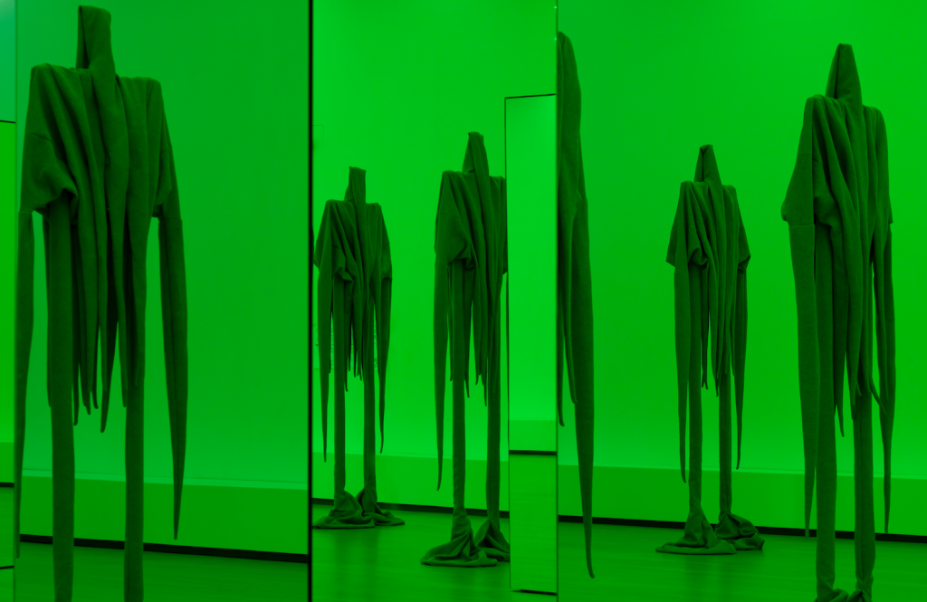 Sandra Mujinga work with green background