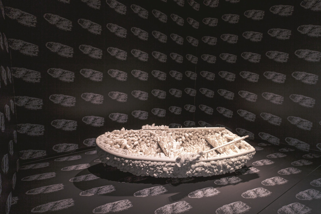 white boat of white shapes in a dark space