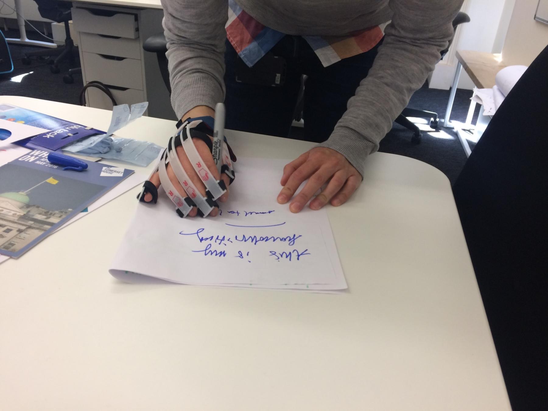 Nat Writing With Dexterity Impairment Gloves