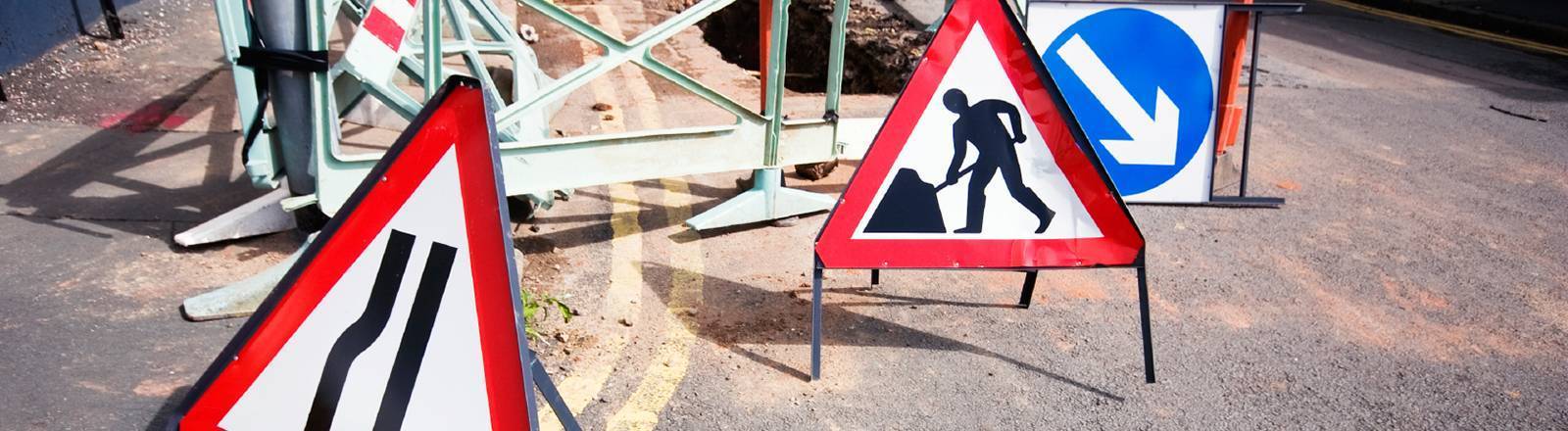 NRSWA Re-assessment courses nationwide - street work signs laid out on road
