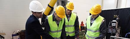 Group training, team with PPE hardhats and high vis