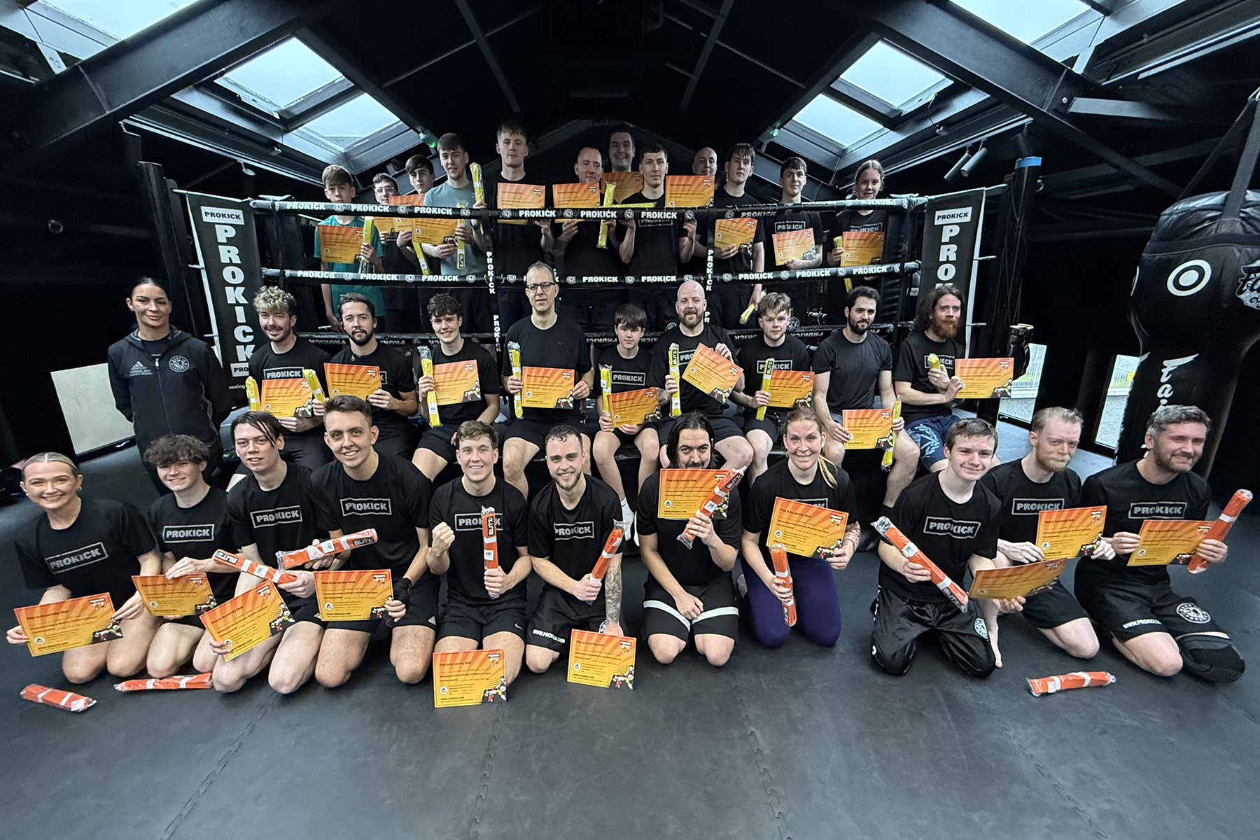 Adults attempting Yellow and Orange Belt, the first two levels at ProKick