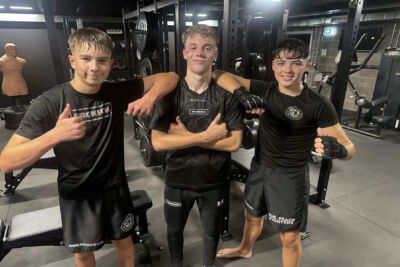 Three Junior Black Belts - Ethan Rodgers, Max Murray, and Reuben Graham - have earned 22 GCSEs between them.