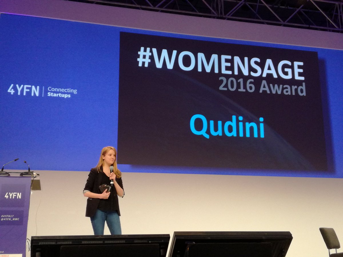 Imogen Wethered accepting an award for Qudini