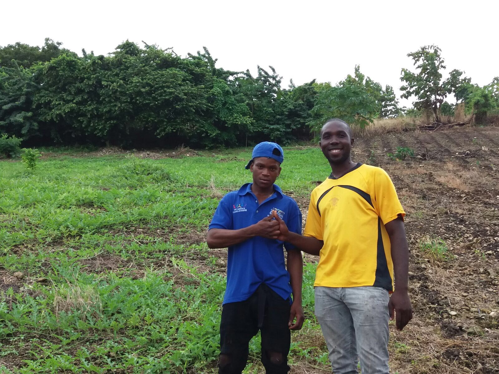 Rohan (left) and another young farmer, Ron