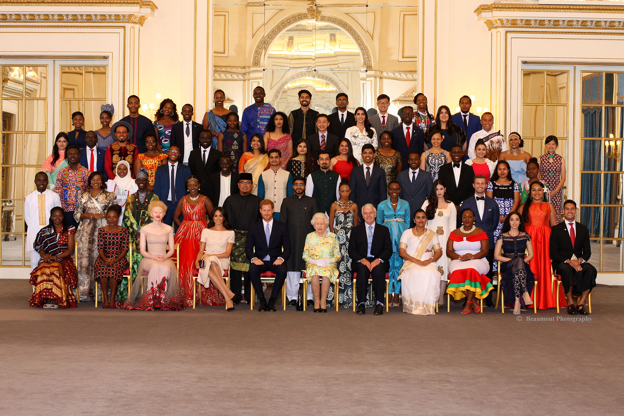 Her Majesty The Queen presents Awards to the 2018 Queen’s Young Leaders Award winners at Buckingham Palace. Their Royal Highnesses The Duke and Duchess Of Sussex and The Rt Hon Sir John Major KG CH, Chairman of The Queen Elizabeth Diamond Jubilee Trust also joined The Award winners to congratulate them on their remarkable achievements. Guests at the ceremony include Sir John Major, David Beckham OBE, Sir Lenny Henry CBE, Nicola Adams OBE, Neelam Gill, Caspar Lee, Tina Daheley, Emma Gannon and Ore Oduba.