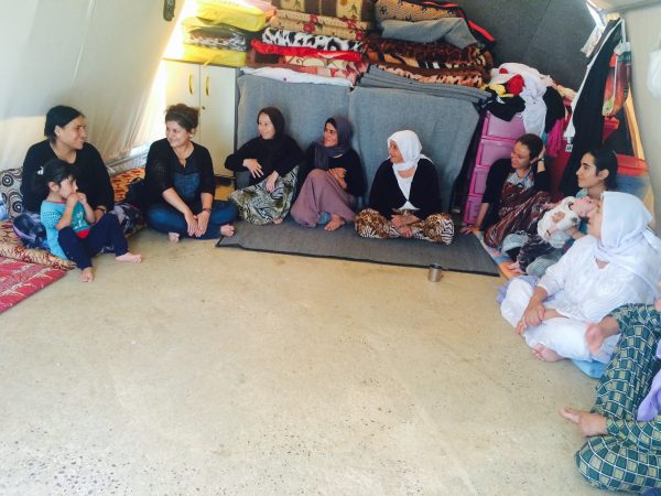 Yanar Mohammed visiting Yazidi women in a refugee camp near the city of Dohuk in Kurdistan, September 2015