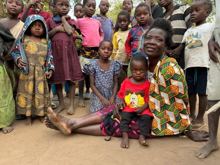 A child embraced by community