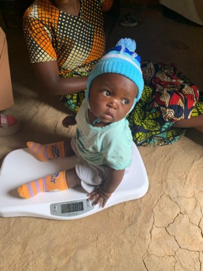 A baby on weighing scales