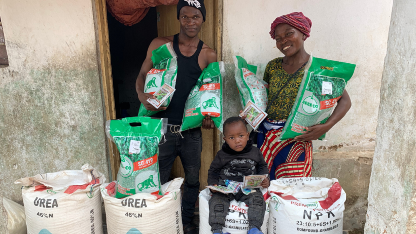 family with seeds and fertiliser