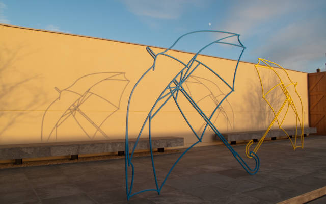 Michael Craig Martin's installation sculptures 'Umbrella (yellow) and Umbrella (blue)', 2011, steel at the Windmill Hill Archive, Waddesdon, Buckinghamshire.