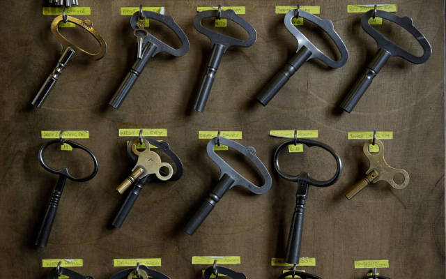 Clock keys hang on a board at Waddesdon Manor