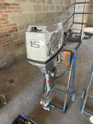 Four stroke Honda BF15A with remote throttle and stand